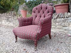 Howard and Sons button back antique armchair.jpg
